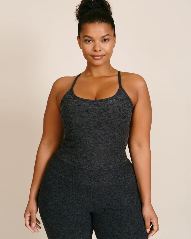 Front of a model wearing a size 1X Spacedye Slim Racerback Cropped Tank in Black Charcoal by Beyond Yoga. | dia_product_style_image_id:231448